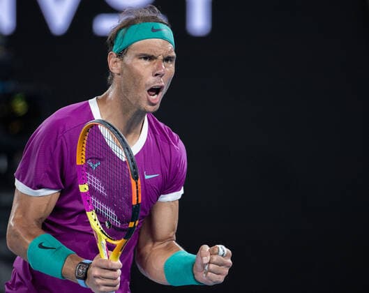 (220128) -- MELBOURNE, Jan. 28, 2022 -- Rafael Nadal of Spain celebrates during the men s singles semifinal match between Rafael Nadal of Spain and Matteo Berrettini of Italy at Australian Open in Melbourne Park, in Melbourne, Australia, on Jan. 28, 2022. (Photo by Hu Jingchen Xinhua) (SP)AUSTRALIA-MELBOURNE-TENNIS-AUSTRALIAN OPEN-MEN S SINGLES-SEMIFINALS BaixXuefei 