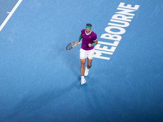 (220128) -- MELBOURNE, Jan. 28, 2022 -- Rafael Nadal of Spain celebrates during the men s singles semifinal match between Rafael Nadal of Spain and Matteo Berrettini of Italy at Australian Open in Melbourne Park, in Melbourne, Australia, on Jan. 28, 2022. (Photo by Hu Jingchen Xinhua) (SP)AUSTRALIA-MELBOURNE-TENNIS-AUSTRALIAN OPEN-MEN S SINGLES-SEMIFINALS BaixXuefei 