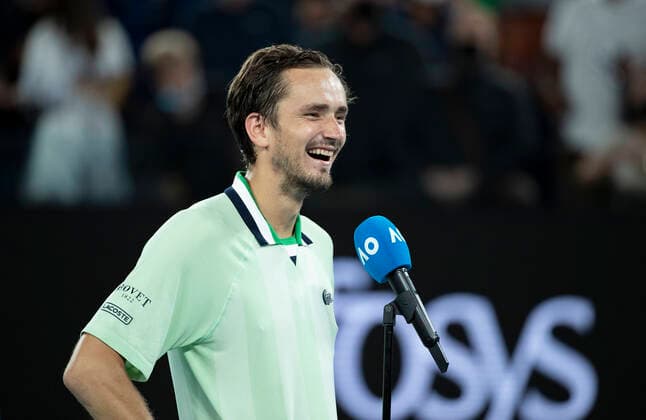 (220128) -- MELBOURNE, Jan. 28, 2022 -- Daniil Medvedev of Russia celebrates after the men s singles semifinal match between Stefanos Tsitsipas of Greece and Daniil Medvedev of Russia at Australian Open in Melbourne Park, in Melbourne, Australia, on Jan. 28, 2022. ) (SP)AUSTRALIA-MELBOURNE-TENNIS-AUSTRALIAN OPEN-MEN S SINGLES-SEMIFINALS BaixXuefei 