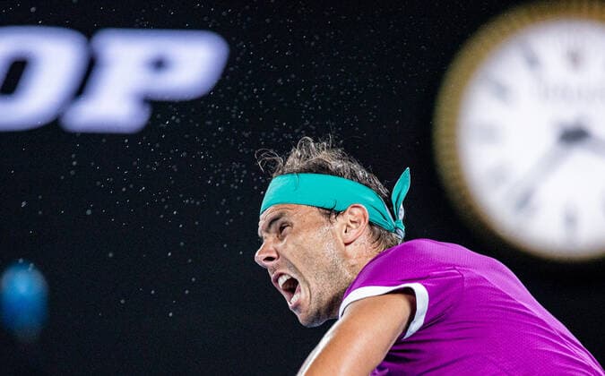 (220128) -- MELBOURNE, Jan. 28, 2022 -- Rafael Nadal of Spain competes during the men s singles semifinal match between Rafael Nadal of Spain and Matteo Berrettini of Italy at Australian Open in Melbourne Park, in Melbourne, Australia, on Jan. 28, 2022. (Photo by Hu Jingchen Xinhua) (SP)AUSTRALIA-MELBOURNE-TENNIS-AUSTRALIAN OPEN-MEN S SINGLES-SEMIFINALS BaixXuefei 