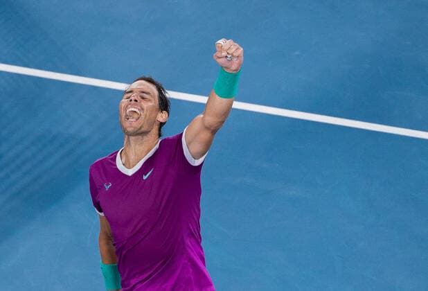 (220128) -- MELBOURNE, Jan. 28, 2022 -- Rafael Nadal of Spain celebrates after winning the men s singles semifinal match between Rafael Nadal of Spain and Matteo Berrettini of Italy at Australian Open in Melbourne Park, in Melbourne, Australia, on Jan. 28, 2022. (Photo by Hu Jingchen Xinhua) (SP)AUSTRALIA-MELBOURNE-TENNIS-AUSTRALIAN OPEN-MEN S SINGLES-SEMIFINALS BaixXuefei 