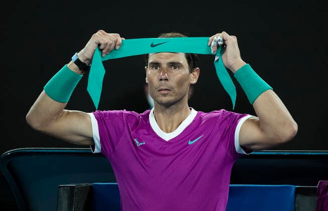 (220128) -- MELBOURNE, Jan. 28, 2022 -- Rafael Nadal of Spain reacts during the men s singles semifinal match between Rafael Nadal of Spain and Matteo Berrettini of Italy at Australian Open in Melbourne Park, in Melbourne, Australia, on Jan. 28, 2022. ) (SP)AUSTRALIA-MELBOURNE-TENNIS-AUSTRALIAN OPEN-MEN S SINGLES-SEMIFINALS BaixXuefei 
