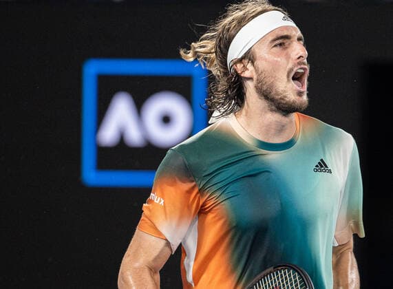 (220128) -- MELBOURNE, Jan. 28, 2022 -- Stefanos Tsitsipas of Greece competes during the men s singles semifinal match between Stefanos Tsitsipas of Greece and Daniil Medvedev of Russia at Australian Open in Melbourne Park, in Melbourne, Australia, on Jan. 28, 2022. (Photo by Xinhua) (SP)AUSTRALIA-MELBOURNE-TENNIS-AUSTRALIAN OPEN-MEN S SINGLES-SEMIFINALS HuxJingchen 