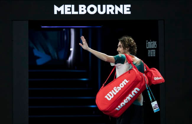 (220128) -- MELBOURNE, Jan. 28, 2022 -- Stefanos Tsitsipas of Greece greets Audience after the men s singles semifinal match between Stefanos Tsitsipas of Greece and Daniil Medvedev of Russia at Australian Open in Melbourne Park, in Melbourne, Australia, on Jan. 28, 2022. ) (SP)AUSTRALIA-MELBOURNE-TENNIS-AUSTRALIAN OPEN-MEN S SINGLES-SEMIFINALS BaixXuefei 