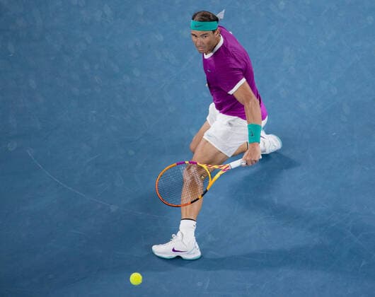 (220128) -- MELBOURNE, Jan. 28, 2022 -- Rafael Nadal of Spain competes during the men s singles semifinal match between Rafael Nadal of Spain and Matteo Berrettini of Italy at Australian Open in Melbourne Park, in Melbourne, Australia, on Jan. 28, 2022. (Photo by Hu Jingchen Xinhua) (SP)AUSTRALIA-MELBOURNE-TENNIS-AUSTRALIAN OPEN-MEN S SINGLES-SEMIFINALS BaixXuefei 