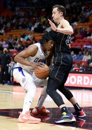 Los Angeles Clippers forward forward Terrance Mann (L) is defended by Miami Heat forward Duncan Robinson (R) during the first half of the NBA, Basketball Herren, USA basketball game between the Miami Heat and the Los Angeles Clippers at FTX Arena in Miami, Florida, USA, 28 January 2022. Los Angeles Clippers at Miami Heat !ACHTUNG: NUR REDAKTIONELLE NUTZUNG!  Copyright: xRHONAxWISEx AME2087 20220129-e91acfe2d697dda2a89847046306686e93883adf