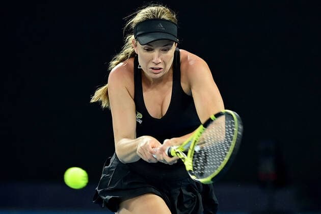 TENNIS AUSTRALIAN OPEN, Danielle Collins of the USA plays a shot during the Women?s singles final against Ashleigh Barty of Australia on Day 13 of the Australian Open, at Melbourne Park, in Melbourne, Saturday, January 29, 2022. ( NO ARCHIVING, EDITORIAL USE ONLY, NO USE IN BOOKS WITHOUT CONSENT MELBOURNE VIC AUSTRALIA  Copyright: xJOELxCARRETTx 20220129001618073798