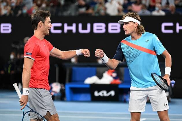 Mandatory Credit: Photo by James Gourley Shutterstock (12778010ff) Matt Ebden and Max Purcell during the Men s Doubles final Australian Open, Day Thirteen, Tennis, Melbourne Park, Melbourne, Australia - 29 Jan 2022 Australian Open, Day Thirteen, Tennis, Melbourne Park, Melbourne, Australia - 29 Jan 2022 Copyright: xJamesxGourley Shutterstockx 12778010ff