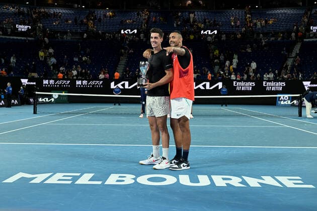 TENNIS AUSTRALIAN OPEN, Thanasi Kokkinakis and Nick Kyrgios of Australia pose for photographs with the trophy after winning the Men?s doubles final against Matthew Ebden and Max Purcell of Australia on Day 13 of the Australian Open, at Melbourne Park, in Melbourne, Saturday, January 29, 2022. ( NO ARCHIVING, EDITORIAL USE ONLY, NO USE IN BOOKS WITHOUT CONSENT MELBOURNE VIC AUSTRALIA  Copyright: xDEANxLEWINSx 20220130001618112226