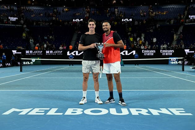 TENNIS AUSTRALIAN OPEN, Thanasi Kokkinakis and Nick Kyrgios of Australia pose for photographs with the trophy after winning the Men?s doubles final against Matthew Ebden and Max Purcell of Australia on Day 13 of the Australian Open, at Melbourne Park, in Melbourne, Saturday, January 29, 2022. ( NO ARCHIVING, EDITORIAL USE ONLY, NO USE IN BOOKS WITHOUT CONSENT MELBOURNE VIC AUSTRALIA  Copyright: xDEANxLEWINSx 20220130001618112386