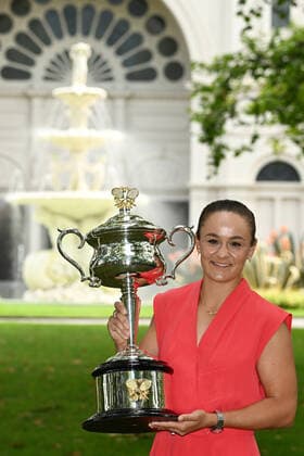 ASHLEIGH BARTY AUSTRALIAN OPEN 2022, Ashleigh Barty of Australia celebrates with champagne during a photo shoot with the Daphne Akhurst Memorial Cup during a media opportunity a day after winning the Women?s singles final of the Australian Open tennis tournament in Melbourne, Sunday, January 30, 2022. ( NO ARCHIVING, EDITORIAL USE ONLY, NO USE IN BOOKS WITHOUT CONSENT MELBOURNE VIC AUSTRALIA  Copyright: xDAVExHUNTx 20220130001618287623