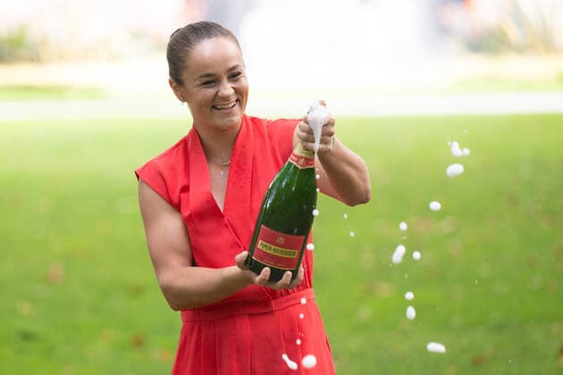 Mandatory Credit: Photo by James Gourley Shutterstock (12778011o) Ashleigh Barty celebrates with Champagne Australian Open, Day Fourteen, Tennis, Melbourne Park, Melbourne, Australia - 30 Jan 2022 Australian Open, Day Fourteen, Tennis, Melbourne Park, Melbourne, Australia - 30 Jan 2022 Copyright: xJamesxGourley Shutterstockx 12778011o