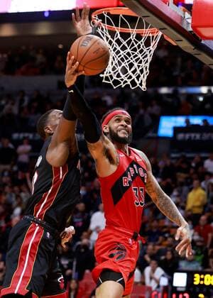 Toronto Raptors guard Gary Trent Jr. tries to shoot around Miami Heat center Bam Adebayo during the third overtime of the NBA, Basketball Herren, USA basketball game between the Miami Heat and the Toronto Raptors at FTX Arena in Miami, Florida, USA, 29 January 2022. Toronto Raptors at Miami Heat !ACHTUNG: NUR REDAKTIONELLE NUTZUNG!  Copyright: xRHONAxWISEx AME2280 20220130-b9f202161b9f28a54511a682d6af6b4f2be53e28