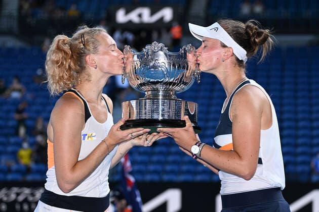 TENNIS AUSTRALIAN OPEN, Barbara Krejcikova and katerina Siniakova of Czech Republic with the trophy following their win in the women?s doubles final against Anna Danilina of Kazakhstan and Beatriz Haddad Maia of Brazil on Day 14 of the Australian Open at Melbourne Park in Melbourne, Sunday, January 30, 2022. ( NO ARCHIVING, EDITORIAL USE ONLY, NO USE IN BOOKS WITHOUT CONSENT MELBOURNE VIC AUSTRALIA  Copyright: xDAVExHUNTx 20220130001618386473