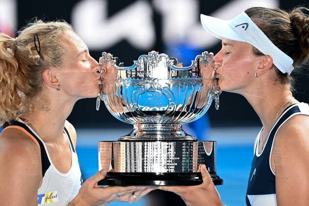 Mandatory Credit: Photo by James Gourley Shutterstock (12778011x) Barbora Krejcikova and Katerina Siniakova celebrate winning the Womens Doubles final Australian Open, Day Fourteen, Tennis, Melbourne Park, Melbourne, Australia - 30 Jan 2022 Australian Open, Day Fourteen, Tennis, Melbourne Park, Melbourne, Australia - 30 Jan 2022  Copyright: xJamesxGourley Shutterstockx 12778011x