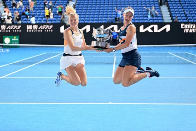 Mandatory Credit: Photo by James Gourley Shutterstock (12778011z) Barbora Krejcikova and Katerina Siniakova celebrate winning the Womens Doubles final Australian Open, Day Fourteen, Tennis, Melbourne Park, Melbourne, Australia - 30 Jan 2022 Australian Open, Day Fourteen, Tennis, Melbourne Park, Melbourne, Australia - 30 Jan 2022  Copyright: xJamesxGourley Shutterstockx 12778011z