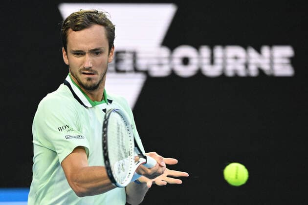 TENNIS AUSTRALIAN OPEN, Russia?s Daniil Medvedev plays a shot during the men?s singles final with Spain?s Rafael Nadal on Day 14 of the Australian Open at Melbourne Park in Melbourne, Saturday, January 29, 2022. ( NO ARCHIVING, EDITORIAL USE ONLY, NO USE IN BOOKS WITHOUT CONSENT MELBOURNE VIC AUSTRALIA  Copyright: xDEANxLEWINSx 20220130001618403593