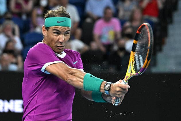TENNIS AUSTRALIAN OPEN, Spain?s Rafael Nadal plays a shot during the men?s singles final with Russia?s Daniil Medvedev on Day 14 of the Australian Open at Melbourne Park in Melbourne, Sunday, January 30, 2022. ( NO ARCHIVING, EDITORIAL USE ONLY, NO USE IN BOOKS WITHOUT CONSENT MELBOURNE VIC AUSTRALIA  Copyright: xDEANxLEWINSx 20220130001618408194