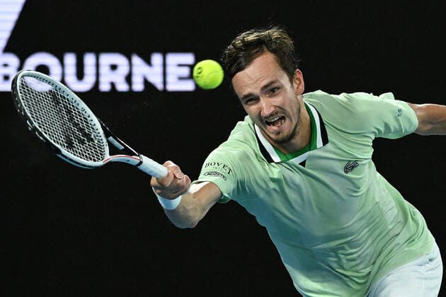 TENNIS AUSTRALIAN OPEN, Daniil Medvedev of Russia plays a shot during the men?s singles final against Rafael Nadal of Spain on Day 14 of the Australian Open at Melbourne Park in Melbourne, Sunday, January 30, 2022. ( NO ARCHIVING, EDITORIAL USE ONLY, NO USE IN BOOKS WITHOUT CONSENT MELBOURNE VIC AUSTRALIA  Copyright: xDEANxLEWINSx 20220130001618408772