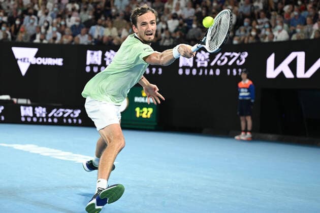 TENNIS AUSTRALIAN OPEN, Daniil Medvedev of Russia plays a shot during the men?s singles final against Rafael Nadal of Spain on Day 14 of the Australian Open at Melbourne Park in Melbourne, Sunday, January 30, 2022. ( NO ARCHIVING, EDITORIAL USE ONLY, NO USE IN BOOKS WITHOUT CONSENT MELBOURNE VIC AUSTRALIA  Copyright: xDAVExHUNTx 20220130001618411631