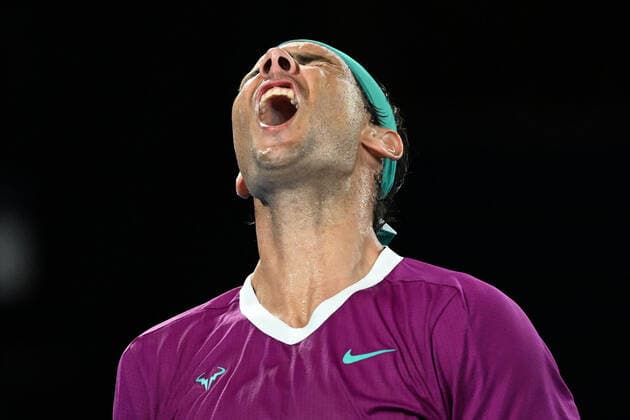 TENNIS AUSTRALIAN OPEN, Rafael Nadal of Spain reacts after missing a shot during the men?s singles final against Daniil Medveded of Russia on Day 14 of the Australian Open at Melbourne Park in Melbourne, Saturday, January 29, 2022. ( NO ARCHIVING, EDITORIAL USE ONLY, NO USE IN BOOKS WITHOUT CONSENT MELBOURNE VIC AUSTRALIA  Copyright: xDEANxLEWINSx 20220130001618430007