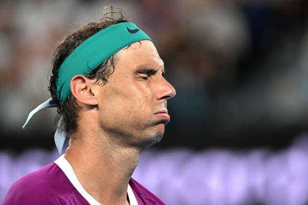 TENNIS AUSTRALIAN OPEN, Rafael Nadal of Spain reacts after missing a shot during the men?s singles final against Daniil Medvedev of Russia on Day 14 of the Australian Open at Melbourne Park in Melbourne, Sunday, January 30, 2022. ( NO ARCHIVING, EDITORIAL USE ONLY, NO USE IN BOOKS WITHOUT CONSENT MELBOURNE VIC AUSTRALIA  Copyright: xDAVExHUNTx 20220131001618437781