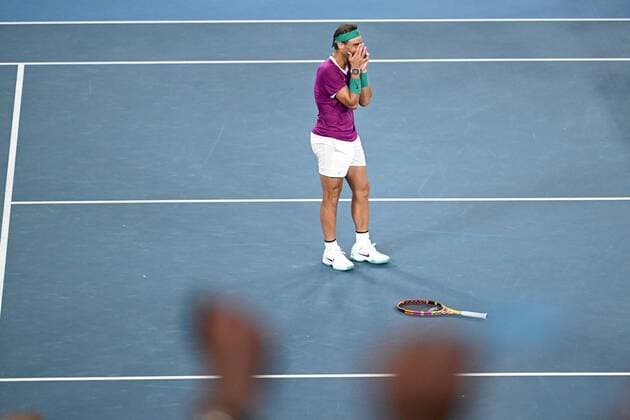 Mandatory Credit: Photo by James Gourley Shutterstock (12778011fo) Rafael Nadal celebrates victory in the Men s Singles final Australian Open, Day Fourteen, Tennis, Melbourne Park, Melbourne, Australia - 30 Jan 2022 Australian Open, Day Fourteen, Tennis, Melbourne Park, Melbourne, Australia - 30 Jan 2022  Copyright: xJamesxGourley Shutterstockx 12778011fo