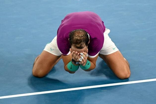Mandatory Credit: Photo by James Gourley Shutterstock (12778011gd) Rafael Nadal celebrates victory in the Men s Singles final Australian Open, Day Fourteen, Tennis, Melbourne Park, Melbourne, Australia - 30 Jan 2022 Australian Open, Day Fourteen, Tennis, Melbourne Park, Melbourne, Australia - 30 Jan 2022  Copyright: xJamesxGourley Shutterstockx 12778011gd