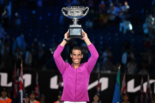 January 31, 2022: 6th seed RAFAEL NADAL (ESP) poses with the trophy after defeating 2nd seed DANIIL MEDVEDEV (RUS) on Rod Laver Arena in the Men s Singles Final match on day 14 of the 2022 Australian Open in Melbourne, Australia. Cal Media. Nadal won 2:6 6:7 6:4 6:4 7:5 USA - ZUMAc04_ 20220131_zaf_c04_004 Copyright: xSydneyxLowx