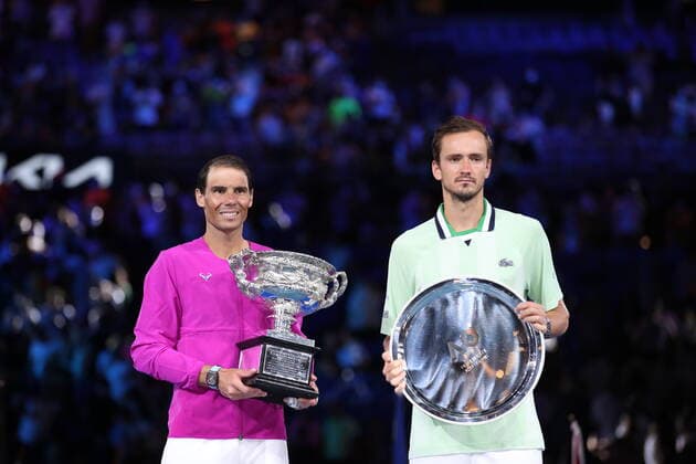 (220130) --MELBOURNE, Jan. 30, 2022 -- Rafael Nadal of Spain (L) and Daniil Medvedev of Russia attend the awarding ceremony after the men s singles final match at Australian Open in Melbourne Park, in Melbourne, Australia, on Jan. 30, 2022. ) (SP)AUSTRALIA-MELBOURNE-TENNIS-AUSTRALIAN OPEN-MEN S SINGLES-FINALS BaixXuefei 
