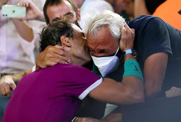 Mandatory Credit: Photo by Ella Ling Shutterstock (12778014fi) Rafael Nadal celebrates victory in the Men s Singles final with his father, Sebastian Nadal Australian Open, Day Fourteen, Tennis, Melbourne Park, Melbourne, Australia - 30 Jan 2022 Australian Open, Day Fourteen, Tennis, Melbourne Park, Melbourne, Australia - 30 Jan 2022  Copyright: xEllaxLing Shutterstockx 12778014fi