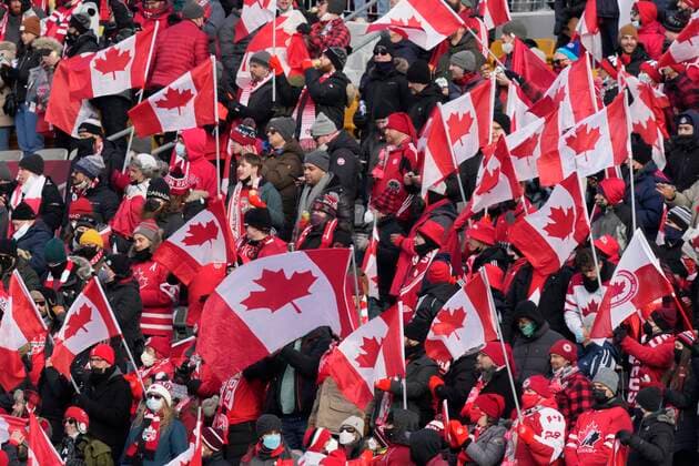 January 30, 2022, Hamilton, ON, CANADA: Canada fans wave flags before the start of the World Cup Qualifier against the USA at sold out Tim Hortons Field in Hamilton, Ontario Sunday Jan. 30, 2022. Canada News - January 30, 2022  - ZUMAc35_ 20220130_zaf_c35_037 Copyright: xFrankxGunnx