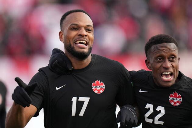 January 30, 2022, Hamilton, ON, CANADA: Canada s Cyle Larin, 17, celebrates his goal against the USA with teammate Richie Laryea, 22, during a men s first half World Cup Qualifier at sold out Tim Hortons Field in Hamilton, Ontario on Sunday Jan. 30, 2022. Canada News - January 30, 2022 - ZUMAc35_ 20220130_zaf_c35_043 Copyright: xNathanxDenettex