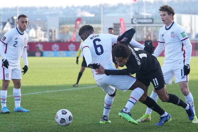 January 30, 2022, Hamilton, ON, CANADA: USA s Yunus Musah, 6, and Canada s Tajon Buchanan, 11, battle for the ball during men s first half World Cup Qualifier at sold out Tim Hortons Field in Hamilton, Ontario on Sunday Jan. 30, 2022. Canada News - January 30, 2022 - ZUMAc35_ 20220130_zaf_c35_058 Copyright: xNathanxDenettex