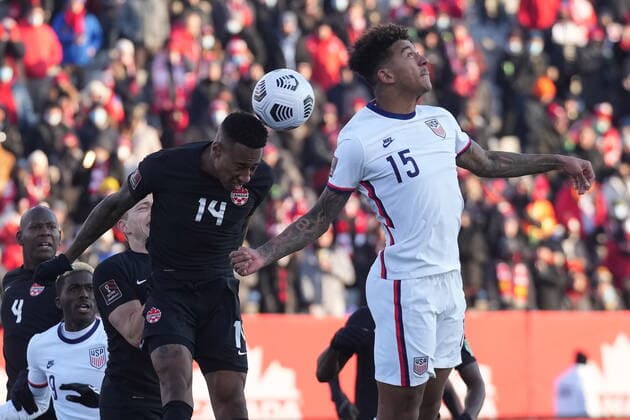 January 30, 2022, Hamilton, ON, CANADA: Canada s Mark-Anthony Kaye, 14, and USA s Chris Richards, 15, battle for the ball during second half men s World Cup Qualifier at sold out Tim Hortons Field in Hamilton, Ontario Sunday Jan. 30, 2022. Canada News - January 30, 2022 - ZUMAc35_ 20220130_zaf_c35_063 Copyright: xNathanxDenettex