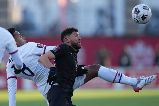 January 30, 2022, Hamilton, ON, CANADA: Canada s Jonathan Osorio, 21, battles USA s Weston McKennie for the ball during second half men s World Cup Qualifier at sold out Tim Hortons Field in Hamilton, Ontario Sunday Jan. 30, 2022. Canada News - January 30, 2022  - ZUMAc35_ 20220130_zaf_c35_069 Copyright: xNathanxDenettex