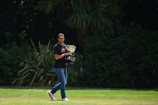RAFAEL NADAL AUSTRALIAN OPEN 2022, Rafael Nadal of Spain poses for a photograph with the Norman Brookes Challenge Cup in Melbourne, Monday, January 31, 2022. Nadal won a record 21st Grand Slam and his second Australian Open title on Sunday after a thrilling five set victory over Daniil Medvedev of Russia. ( NO ARCHIVING, EDITORIAL USE ONLY, NO USE IN BOOKS WITHOUT CONSENT MELBOURNE VICTORIA AUSTRALIA  Copyright: xJOELxCARRETTx 20220131001618641711