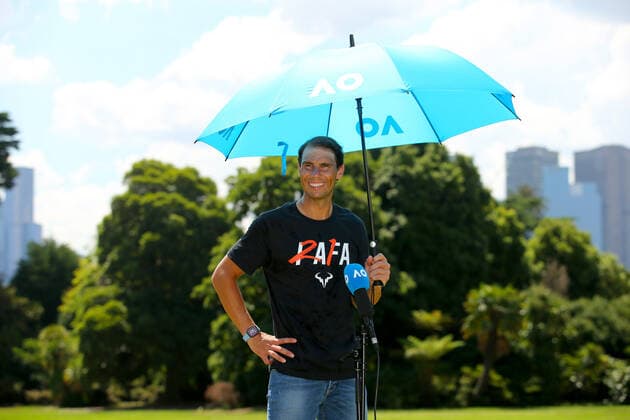 Mandatory Credit: Photo by Ella Ling Shutterstock (12778015b) Rafael Nadal of Spain smiles under and umbrella at Government House for a photo shoot Australian Open, Tennis, Melbourne Park, Melbourne, Australia - 31 Jan 2022 Australian Open, Tennis, Melbourne Park, Melbourne, Australia - 31 Jan 2022  Copyright: xEllaxLing Shutterstockx 12778015b