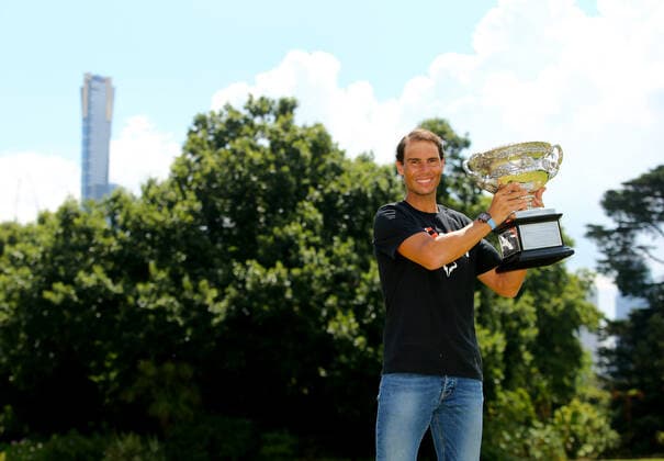Mandatory Credit: Photo by Ella Ling Shutterstock (12778015r) Rafael Nadal of Spain smiles with the trophy at Government House for a photo shoot Australian Open, Tennis, Melbourne Park, Melbourne, Australia - 31 Jan 2022 Australian Open, Tennis, Melbourne Park, Melbourne, Australia - 31 Jan 2022  Copyright: xEllaxLing Shutterstockx 12778015r