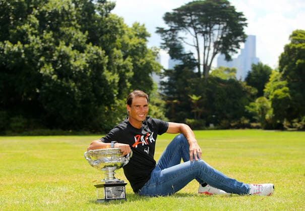 Mandatory Credit: Photo by Ella Ling Shutterstock (12778015n) Rafael Nadal of Spain smiles with the trophy at Government House for a photo shoot Australian Open, Tennis, Melbourne Park, Melbourne, Australia - 31 Jan 2022 Australian Open, Tennis, Melbourne Park, Melbourne, Australia - 31 Jan 2022  Copyright: xEllaxLing Shutterstockx 12778015n