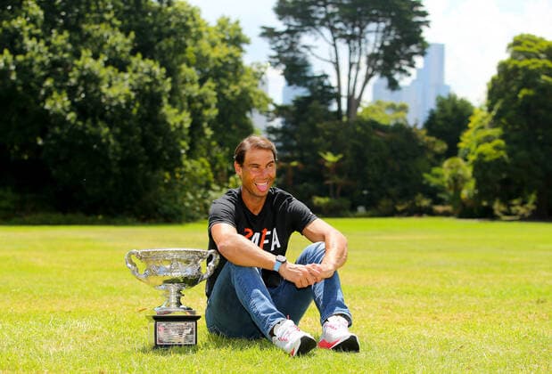 Mandatory Credit: Photo by Ella Ling Shutterstock (12778015l) Rafael Nadal of Spain smiles with the trophy at Government House for a photo shoot Australian Open, Tennis, Melbourne Park, Melbourne, Australia - 31 Jan 2022 Australian Open, Tennis, Melbourne Park, Melbourne, Australia - 31 Jan 2022  Copyright: xEllaxLing Shutterstockx 12778015l