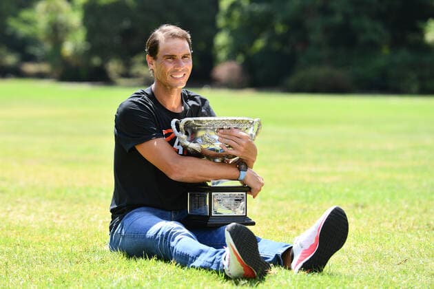 (220131) -- MELBOURNE, Jan. 31, 2022 -- Rafael Nadal of Spain poses with his trophy of Australian Open at Government House in Melbourne, Australia, Jan. 31, 2022. (Photo by Xinhua) (SP)AUSTRALIA-MELBOURNE-TENNIS-AUSTRALIAN OPEN-NADAL-TROPHY BaixXue 