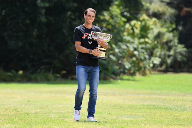 (220131) -- MELBOURNE, Jan. 31, 2022 -- Rafael Nadal of Spain poses with his trophy of Australian Open at Government House in Melbourne, Australia, Jan. 31, 2022. (Photo by Xinhua) (SP)AUSTRALIA-MELBOURNE-TENNIS-AUSTRALIAN OPEN-NADAL-TROPHY BaixXue 