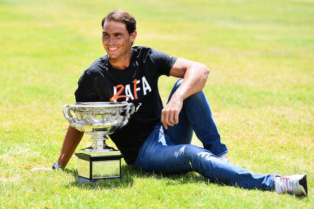 (220131) -- MELBOURNE, Jan. 31, 2022 -- Rafael Nadal of Spain poses with his trophy of Australian Open at Government House in Melbourne, Australia, Jan. 31, 2022. (Photo by Xinhua) (SP)AUSTRALIA-MELBOURNE-TENNIS-AUSTRALIAN OPEN-NADAL-TROPHY BaixXue 