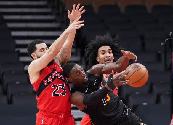 February 1, 2022, TORONTO, ON, CANADA: Miami Heat centre Bam Adebayo (13) battles for the ball against Toronto Raptors guard Fred VanVleet (23) and Raptors forward Justin Champagnie (11) during first half NBA, Basketball Herren, USA basketball action in Toronto on Tuesday, February 1, 2022. Canada News - February 1, 2022  - ZUMAc35_ 20220201_zaf_c35_098 Copyright: xNathanxDenettex