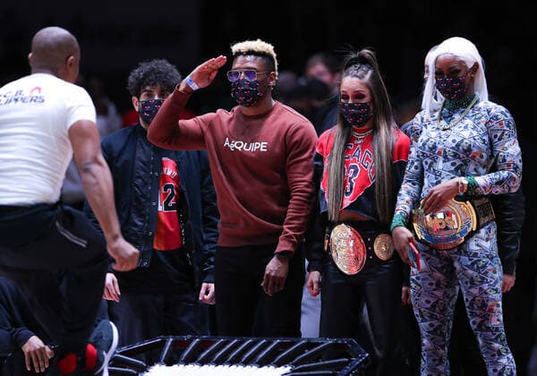 CHICAGO, IL - FEBRUARY 01: All Elite Wrestling owner Tony Kahn, and wrestlers Shawn Dean, AEW womenÕs champion Dr. Britt Baker D.M.D, AEW TBS champion Jade Cargill were part of a event during a timeout during a NBA, Basketball Herren, USA game between the Orlando Magic and the Chicago Bulls on February 1, 2022 at the United Center in Chicago, IL. (Photo by Melissa Tamez Icon Sportswire) NBA: FEB 01 Magic at Bulls Icon22020145