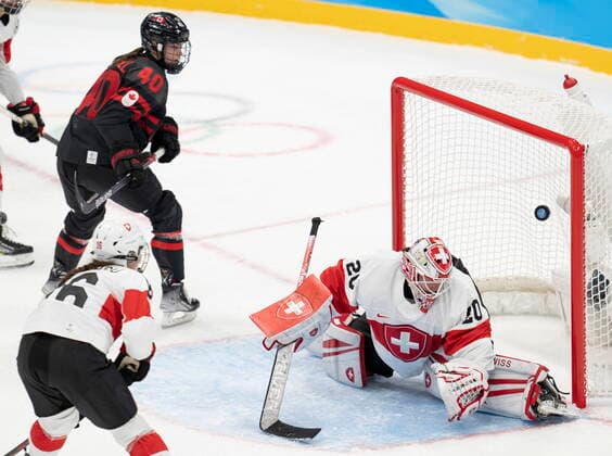 February 3, 2022, Beijing, China: Team Canada forward Blayre Turnbull (40) scores the seventh goal on Team Switzerland goalkeeper Andrea Braendli (20) during second period women s Ice hockey, Eishockey action Thursday, February 3, 2022 at the 2022 Winter Olympics in Beijing. Blayre Turnbull, Andrea Braendli,  - ZUMAc35_ 20220203_zaf_c35_022 Copyright: xRyanxRemiorzx