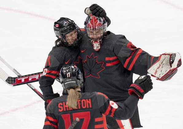 February 3, 2022, Beijing, China: Team Canada goalkeeper Ann-Renee Desbiens (35) celebrates with teammates Jill Saulnier (11) and Ella Shelton (17) after defeating Team Switzerland in women s Ice hockey, Eishockey action Thursday, February 3, 2022 at the 2022 Winter Olympics in Beijing. Ann-Renee Desbiens, Jill Saulnier, Ella Shelton  - ZUMAc35_ 20220203_zaf_c35_025 Copyright: xRyanxRemiorzx