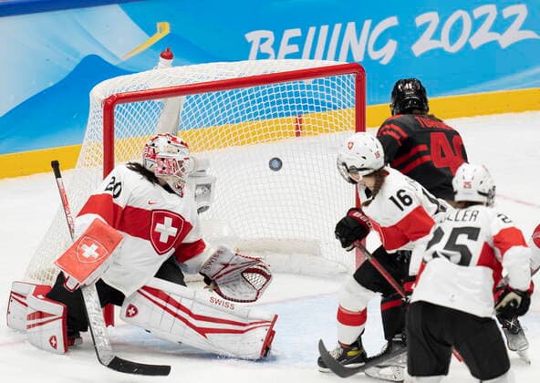 February 3, 2022, Beijing, China: Team Canada forward Blayre Turnbull (40) scores her third goal as Team Switzerland goalkeeper Andrea Braendli (20) and Nicole Vallario (16) look on during third period women s Ice hockey, Eishockey action Thursday, February 3, 2022 at the 2022 Winter Olympics in Beijing. Blayre Turnbull, Andrea Braendli, Nicole Vallario  - ZUMAc35_ 20220203_zaf_c35_029 Copyright: xRyanxRemiorzx