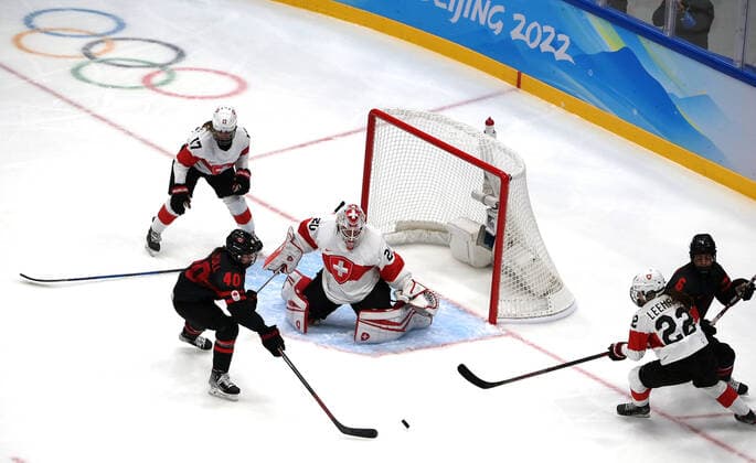 (220203) -- BEIJING, Feb. 3, 2022 -- Athletes compete during the women s Ice hockey, Eishockey preliminary round Group A match between Canada and Switzerland at the National Indoor Stadium in Beijing, China, Feb. 3, 2022. ) (BEIJING2022)CHINA-BEIJING-OLYMPIC Winter games, Winterspiele,Spiele, Summer games ICE HOCKEY-WOMEN S PRELIMINARY (CN) LixAn 